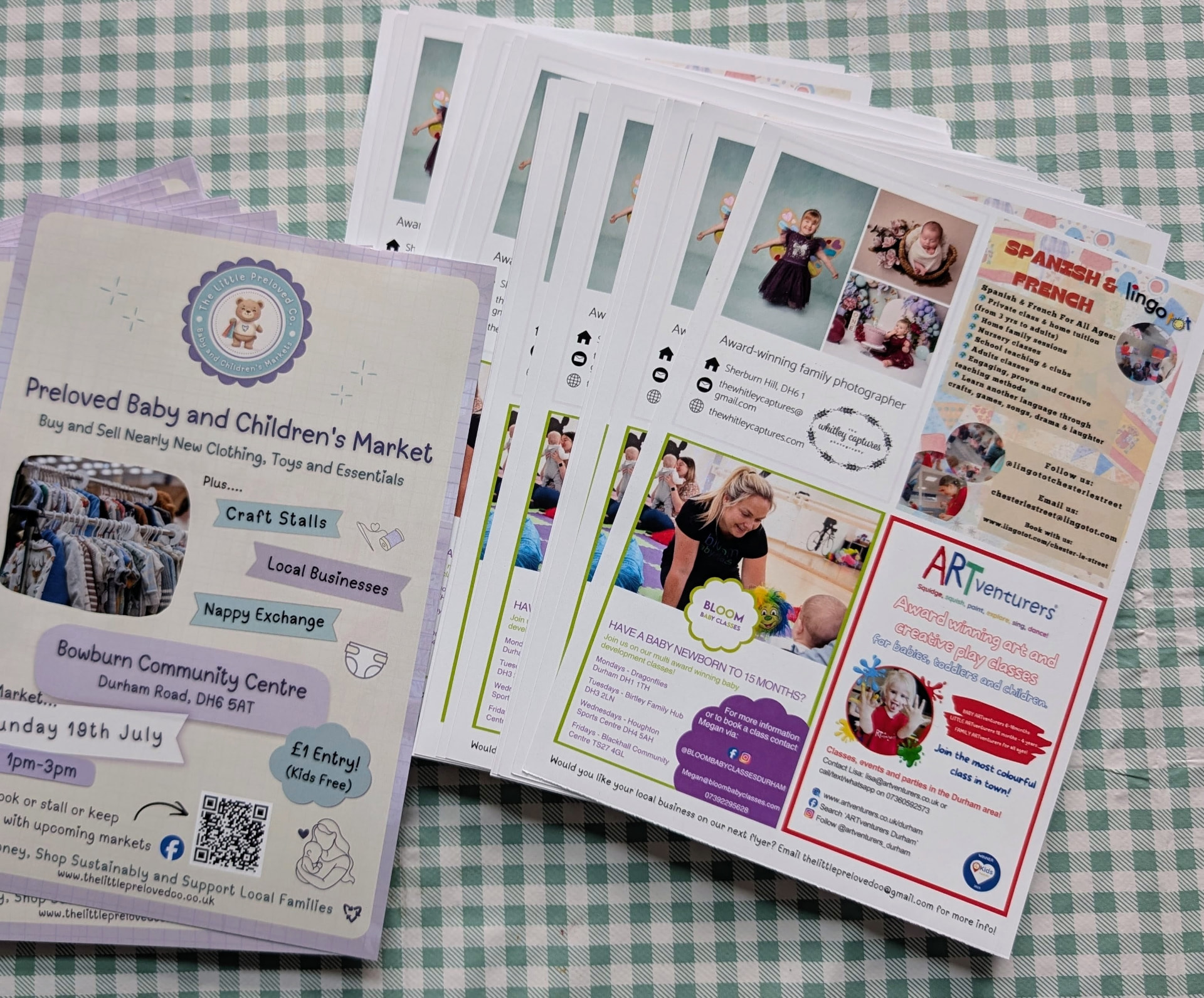 Local business flyers and a Little Preloved Co. market leaflet laid out together
